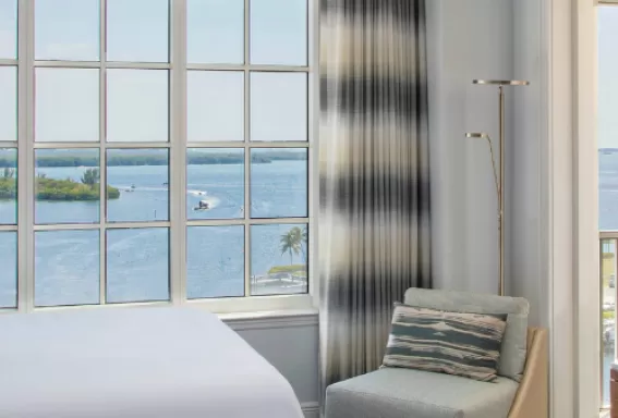 a hotel room with waterfront views